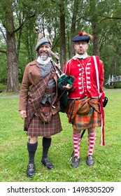 Quebec City, Quebec, Canada, September 7, 2019 - 78th Fraser Highlanders Bagpiper And Soldier In Different Costumes Participating In The Quebec Celtic Festival Held In Domaine De Maizerets 