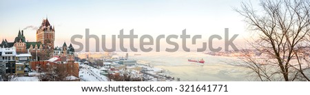 Quebec City skyline panorama with Chateau Frontenac viewed from hill during winter time