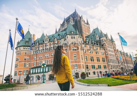 Quebec city travel woman walking on Promenade Terrasse Duffering visiting old town. Autumn Canada vacation destination for cruise ships.