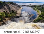 Quebec,Canada,September 2,2023-Montmorency falls falling over 83m to join the St.Lawrence river in this scenic view from the top of the falls near Quebec city, the capital of Quebec province,Canada