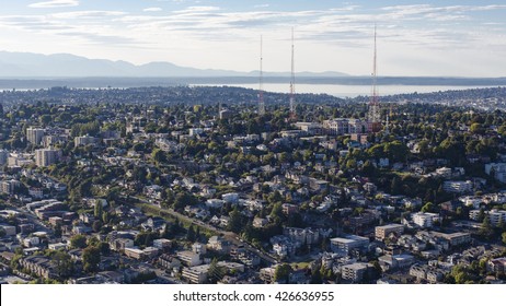 Queen Anne Hill Neighborhood, Downtown Seattle, Washington - Aerial Birds Eye View Of The Pacific Ocean, Olympic Mountains