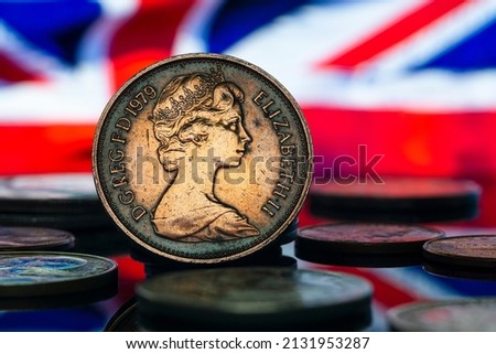 Queen Elizabeth II 2 New Pence Coin 1979 UK Flag Background Macro Close Up