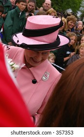 Queen Elizabeth II Smiles Down At A Child During The Royal Visit To Edmonton, Alberta, Canada, May 24, 2005.