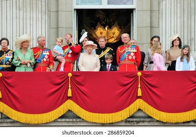 QUEEN ELIZABETH AND ROYAL FAMILY, LONDON, UK - JUNE 13 2015: Royal Family Appears On Buckingham Palace Balcony During Trooping The Colour Prince Harry Prince Philip William Charles George Stock Photo 