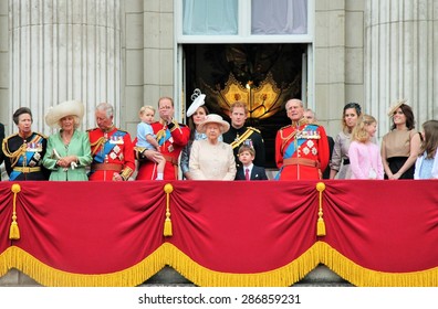 QUEEN ELIZABETH AND ROYAL FAMILY, LONDON, UK - JUNE 13 2015: Royal Family Appears On Buckingham Palace Balcony During Trooping The Colour Prince Harry Prince Philip William Charles George And Kate