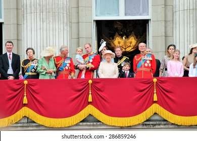 QUEEN ELIZABETH AND ROYAL FAMILY, LONDON, UK - JUNE 13 2015: Royal Family Appears On Buckingham Palace Balcony During Trooping The Colour Prince Harry Prince Philip William Charles George Stock Photo 