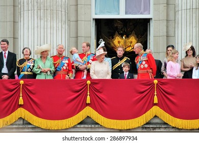 QUEEN ELIZABETH AND ROYAL FAMILY, LONDON, UK - JUNE 13 2015: Royal Family Appears On Buckingham Palace Balcony During Trooping The Colour Prince Harry Prince Philip William Charles George Stock Photo 