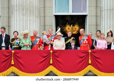 QUEEN ELIZABETH AND ROYAL FAMILY, LONDON, UK - JUNE 13 2015: Royal Family Appears On Buckingham Palace Balcony During Trooping The Colour Prince Harry Prince Philip William Charles George Stock Photo 