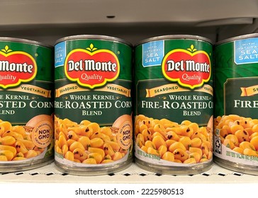 Queens Creek, AZ - Oct 4, 2022: Grocery Store Shelf With Cans Of Del Monte Brand Whole Kernel Fire Roasted Corn. With Natural Sea Salt.