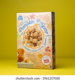 Queens, New York - United States - December 22, 2020: Images Of A Limited Edition Fall Breakfast Cereal With Pumpkin Spice Flavor. Captured On A Yellow Backdrop With A Spoon, Red Bowl, And Apple.