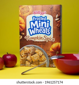 Queens, New York - United States - December 22, 2020: Images Of A Limited Edition Fall Breakfast Cereal With Pumpkin Spice Flavor. Captured On A Yellow Backdrop With A Spoon, Red Bowl, And Apple.