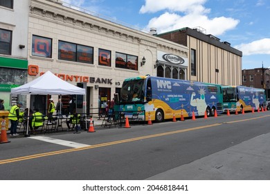 Queens, New York USA - May 31 2021: New York City Mobile Covid-19 Vaccination Buses Along The Street In Astoria Queens New York