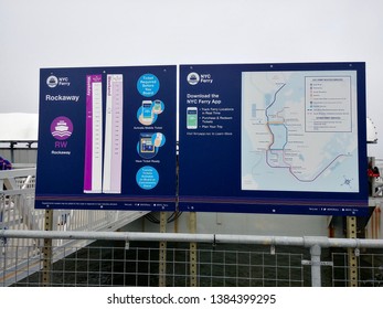 Queens, NY - April 14 2019: Sign With A Schedule And Map For NYC Ferry Service At The Rockaway Ferry Pier