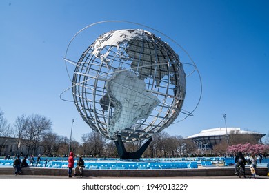 Queens, NY - April 3, 2021: View of the Unisphere, a spherical stainless steel representation of the Earth. Designed by Gilmore D. Clarke for the 1964 New York World's Fair.