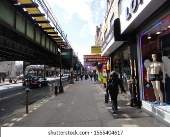 Queens, NY - March 10 2012: View Of A Sidewalk On Roosevelt Avenue In Corona