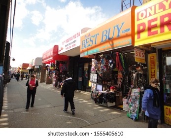 Queens, NY - March 10 2012: View Of Storefronts On Roosevelt Avenue In Jackson Heights