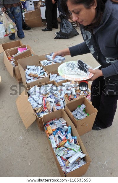 QUEENS, NY\
- NOVEMBER 11: People getting hep with hot food, clothes and\
supplies in the Rockaway due to impact from Hurricane Sandy in\
Queens, New York, U.S., on November 11,\
2012.