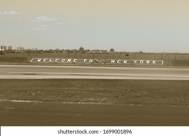 Queens, NY / USA - August 10, 2013: Welcome To New York Sign From La Guardia Airport In Black And White.