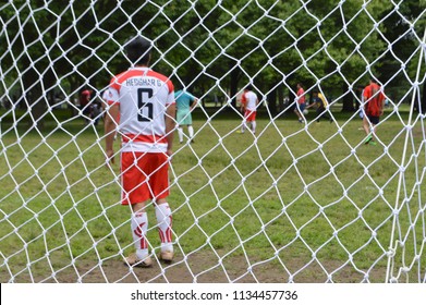 Queens, NY/USA- 6/03/2018: Kids Playing Soccer Game Goalie And Net Goal Post In The Park