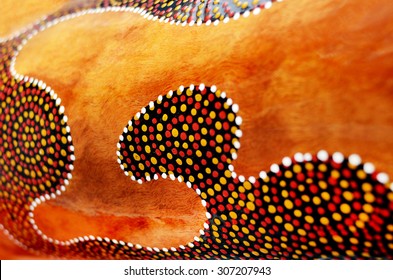 QUEENSLAND, AUS - DEC 20 2014: Indigenous Australian Art Dot Painting On Didgeridoo. It's One Of The Oldest Traditional Form Of Art In The World. Paint Marks To Tell Aboriginal Myths And Legends