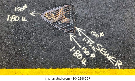 QUEENSLAND, AUSTRALIA - MARCH 10, 2018 : Manhole Covers Is Marked By Before Repairing It, Ashton St Cooparoo