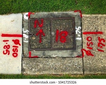 QUEENSLAND, AUSTRALIA - MARCH 9, 2018 : A Manhole Cover On The Walkway Is Marked By Before Repairing It, Meadowlands Rd Carina