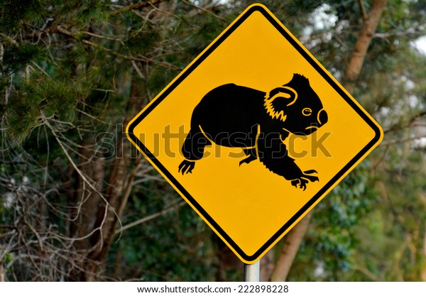 QUEENSLAND -\
OCT 01 2014:Koala warning sign.Wild Australian koalas, face not\
only habitat loss and predation by wild dogs  they are \
increasingly threatened by motor\
vehicles.