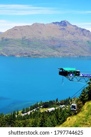 Queenstown Cable Car And Bungee Jump Tower With The Scenic Lake Wakatipu And Mountains In The Background