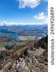 Queenstown and Lake Wakatipu, Otago, South Island, New Zealand, Oceania.
Panoramic view from The Remarkables to Queenstown, Lake Wakatipu and surrounding mountains.