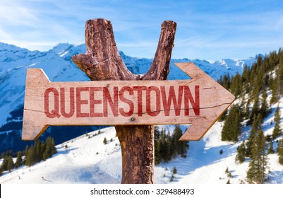 Queenstown Wooden Sign With Winter Background