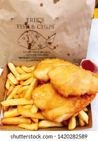 Queenstown/New Zealand: 1 Jul 18: Delicious Erik Fish And Chip Tomato Sauce Big Battered Deep Fried Cod Fish Crispy And French Fries Normal Cut Potato Chip Takeaway Unhealthy Junk Fast Foo 