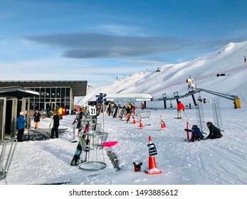 Queenstown/New Zealand: 1 May 19: Coronet Peak In Winter Season Skiing People Covered In Snow Chairlift Snowboarder Beautiful Gorgeous Landscape Of Remarkable Alps Holiday In South Island NZ 