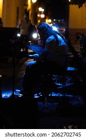 Queretaro, Queretaro, Mexico; 09-22-2020: Street Musician Performing In The Night