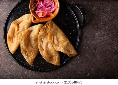 Quesadillas Doradas. Fried Quesadillas Made With Corn Tortillas, They Can Be Filled With Any Dish Or Ingredient, Such As Meat, Potato Or Fish Such As Marlin Or Tuna, Popular During The Lenten Season.