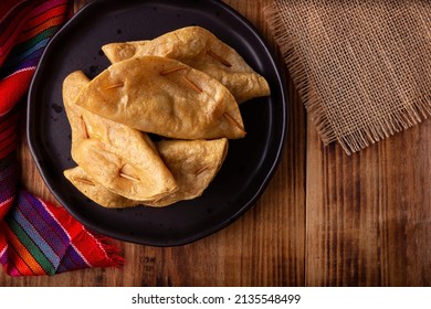 Quesadillas Doradas. Fried Quesadillas Made With Corn Tortillas, They Can Be Filled With Any Dish Or Ingredient, Such As Meat, Potato Or Fish Such As Marlin Or Tuna, Popular During The Lenten Season.