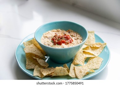 Queso Cheese Dip Topped With Salsa