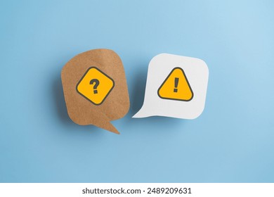 question and answer or communication, customer support or feedback, FAQ concept , white and brown real speech bubbles  paper cut with question and exclamation mark on blue background