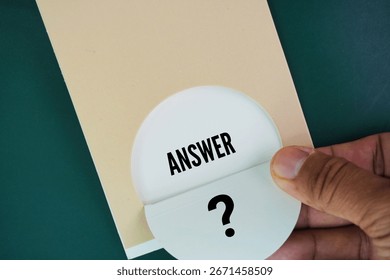 Question and answer marks behind the paper. concept of answers or Q and A. Information, Communication Concepts. Correction or troubleshooting