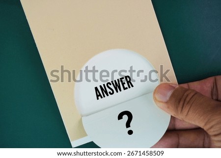 Question and answer marks behind the paper. concept of answers or Q and A. Information, Communication Concepts. Correction or troubleshooting
