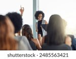 Question, black woman and smile in seminar, speaker and audience in event, training and presentation in boardroom. Workshop, happy and advise for business in conference, entrepreneur and masterclass