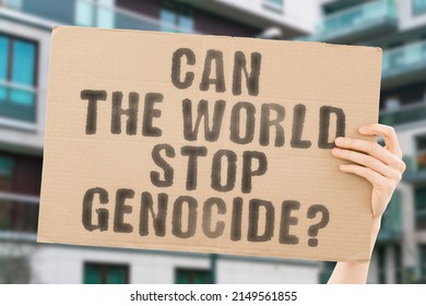The question " Can the world stop genocide? " on a banner in men's hands with blurred background. Illegal. Mass. Politics. Protest. Racism. Risk. Skull. Power. Grave. Conflict. Invasion. Evil. Offense