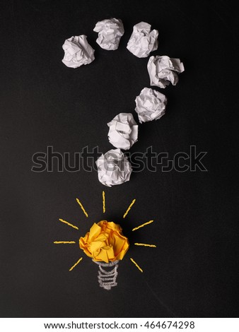 Similar – Question mark, paper balls, light bulb with pens