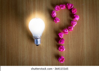 Question mark with lamp