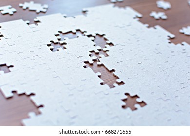 Question mark from the missing parts of the puzzle. Set goals, tasks and ways of their solution and implementation. Business concept. - Powered by Shutterstock - Get 15% off with code: PIKWIZARD15