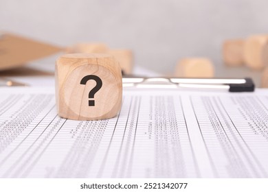 A Question Mark on Financial Documents signals the need for scrutiny and highlights issues