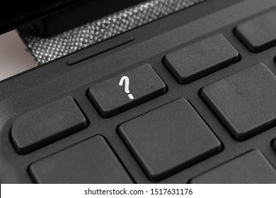 Question Mark On The Keyboard Key Of A Personal Computer Or Laptop Close-up Macro