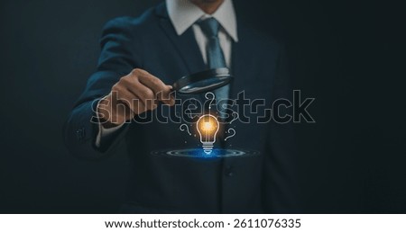 Question mark and problem concept, businessman hold magnifying glass with light bulb and question mark icon show how to do root cause analysis to find answer that occurs during business process.