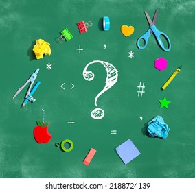 Question Mark With School Supplies On A Chalkboard - Flat Lay