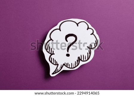 Question mark speech bubble of business concept on purple background.