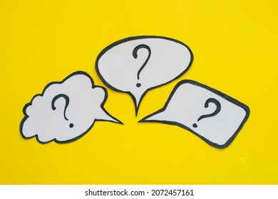Question mark speech bubble isolated on yellow background.